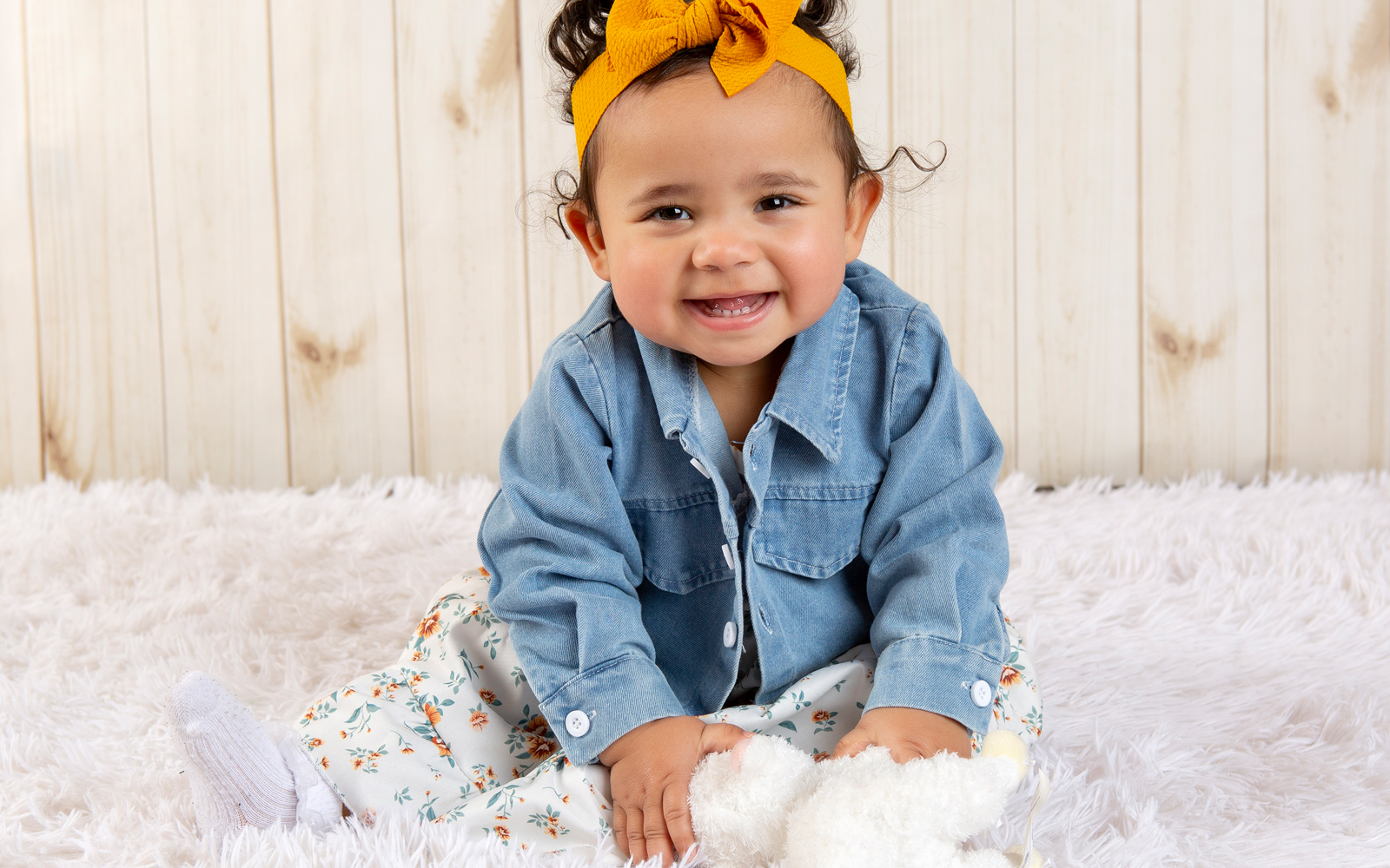 Baby Crystal wearing denim jacket and yellow hair band