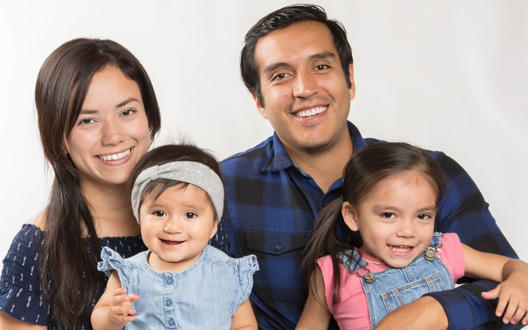 Mom and dad with two children