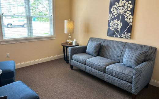 counseling room with gray couch