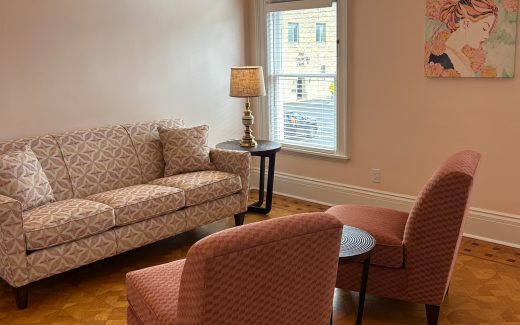 waiting room with pink furniture