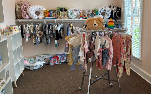 shopping room with baby clothes and items