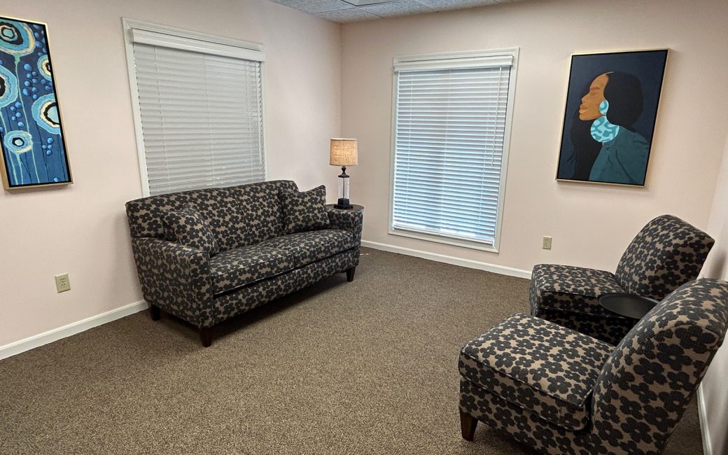 counseling room with black floral furniture